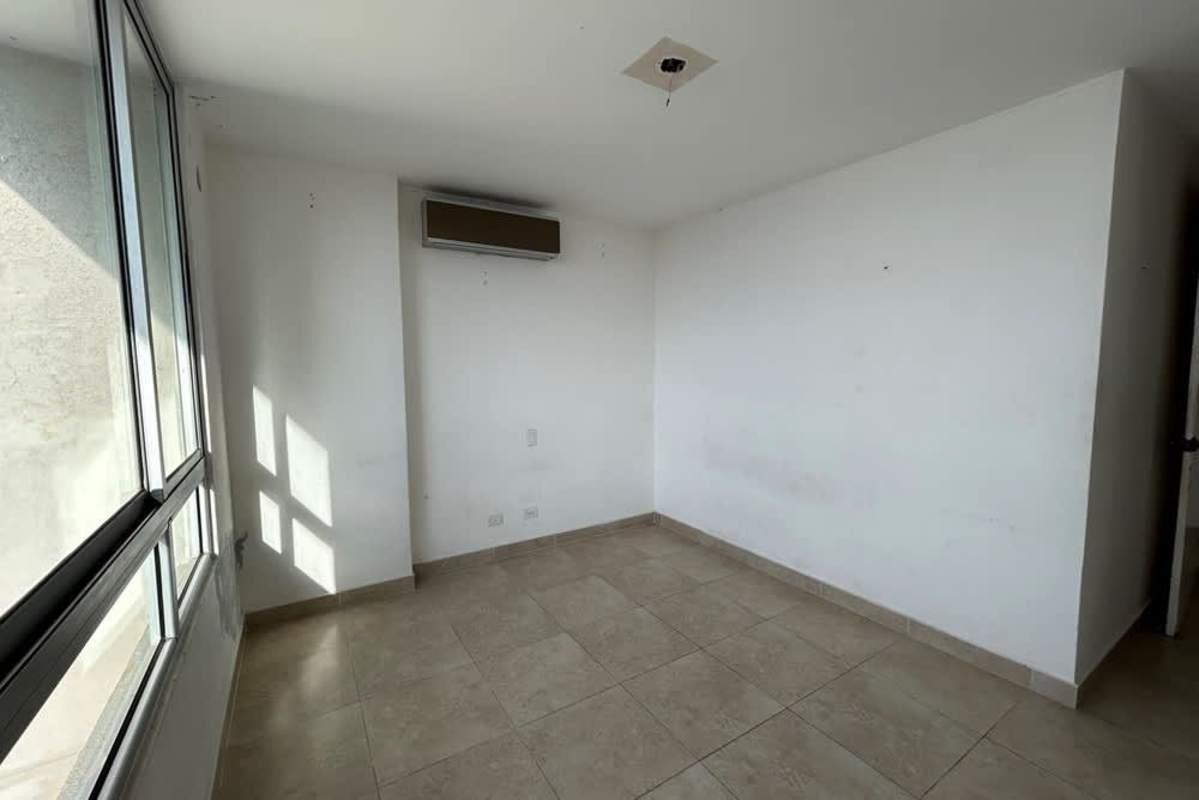 Master bedroom with large windows oceanfront views PH Bahia Pacifica San Francisco Panama City