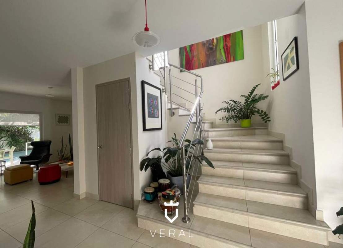 Bright kitchen with marble floors, breakfast bar, upper cabinets in Reserva de Versalles Panama