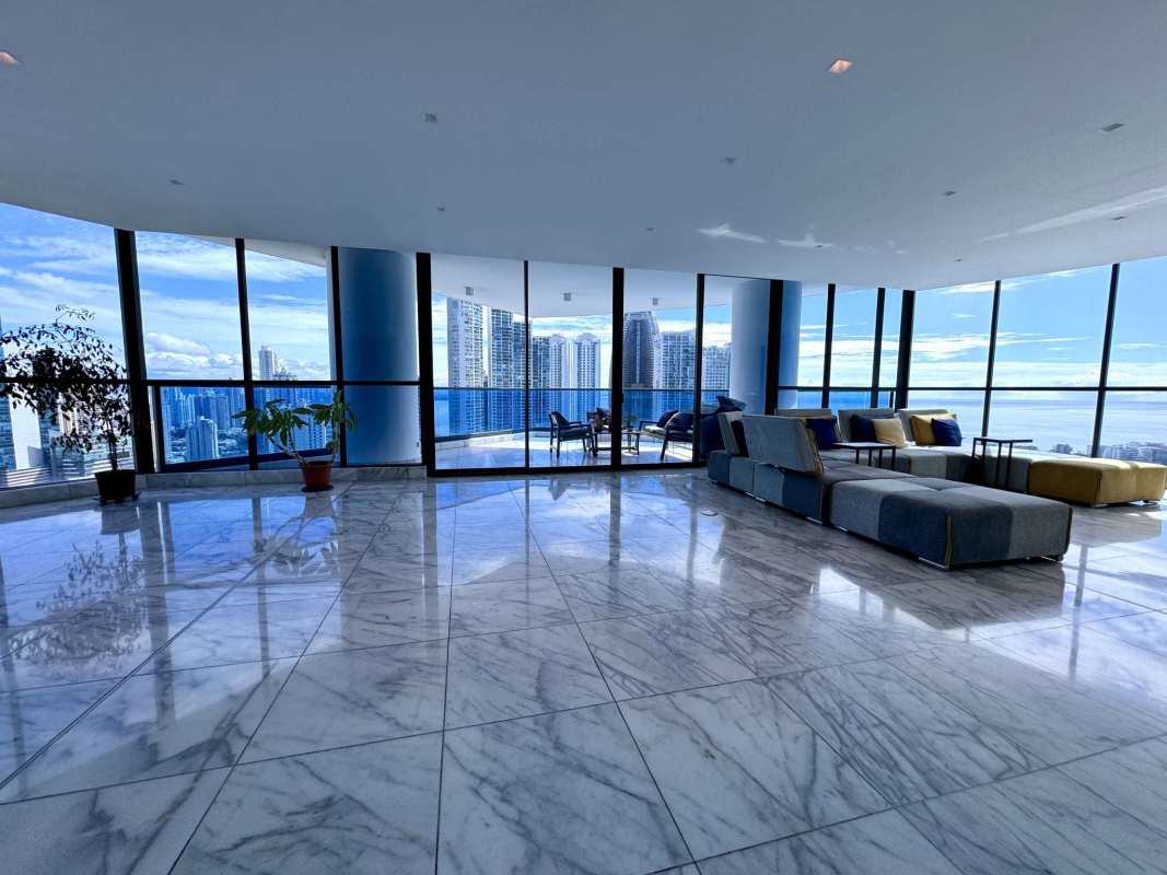 Modern bathroom with marble tiles and glass shower in PH Ocean Front Panama City