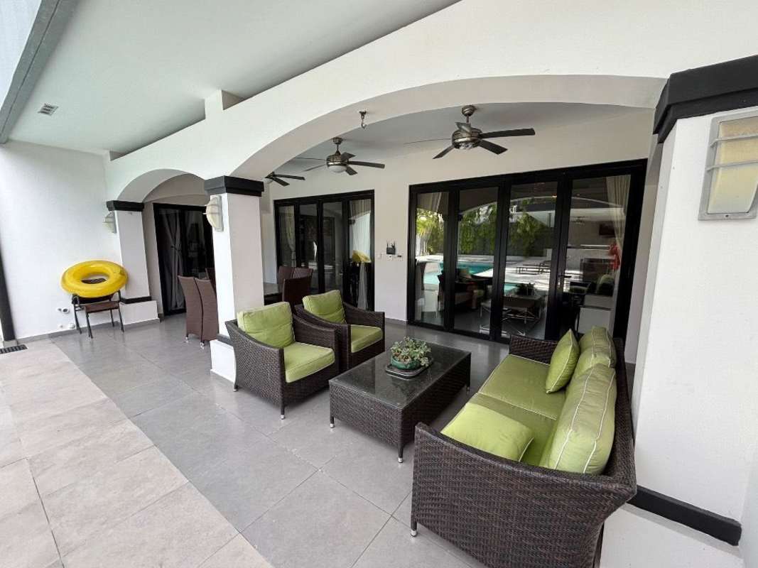 Bright living room with luxury furnishings tiled floor accessoried decor PH Magnolia Panama