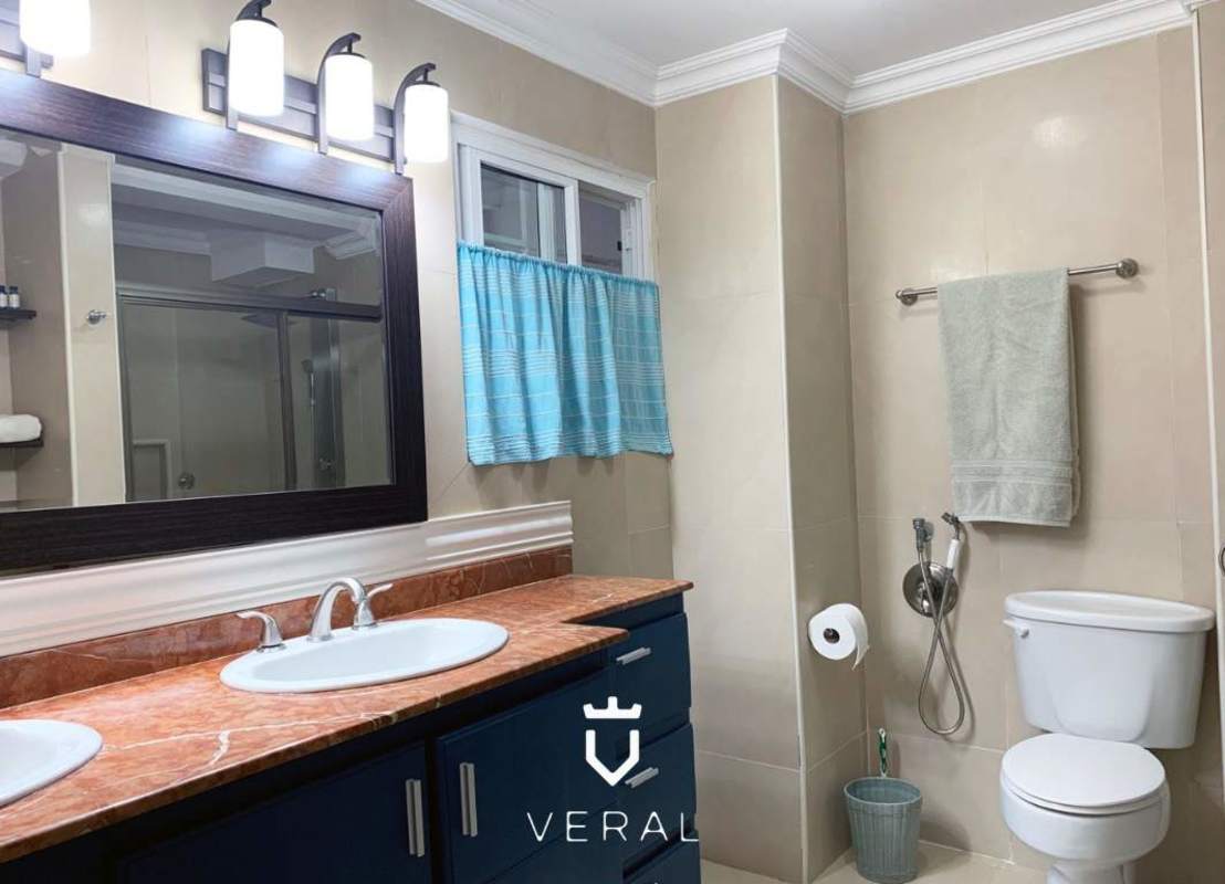 Spacious master bedroom with balcony access and garden view in Albrook Canal Zone
