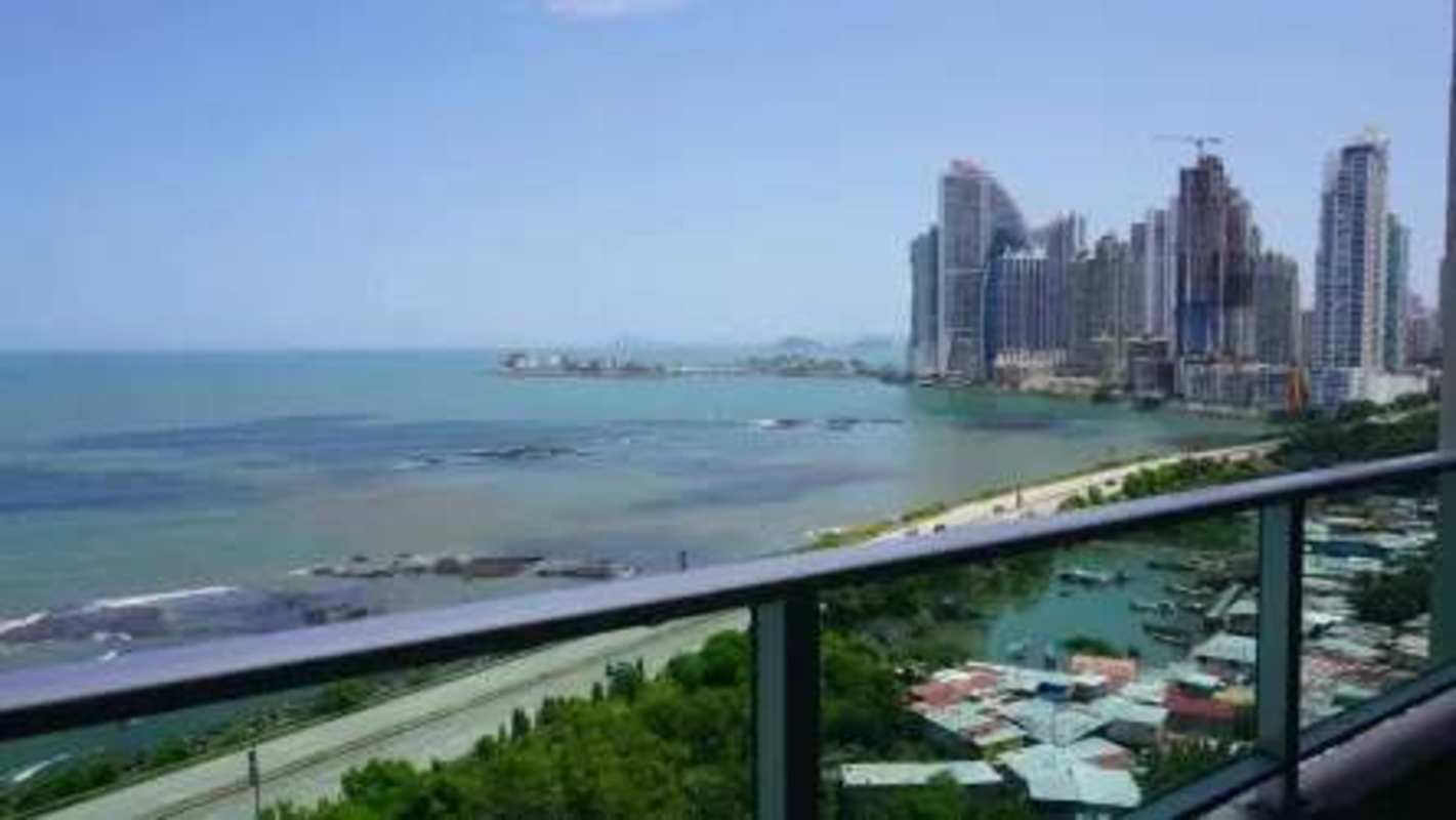 Balcony view overlooking Pacific Ocean and skyline at PH Terrasol Panama City