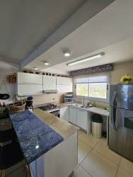 Private furnished balcony overlooking the Pacific Ocean in El Palmar Residences Panama