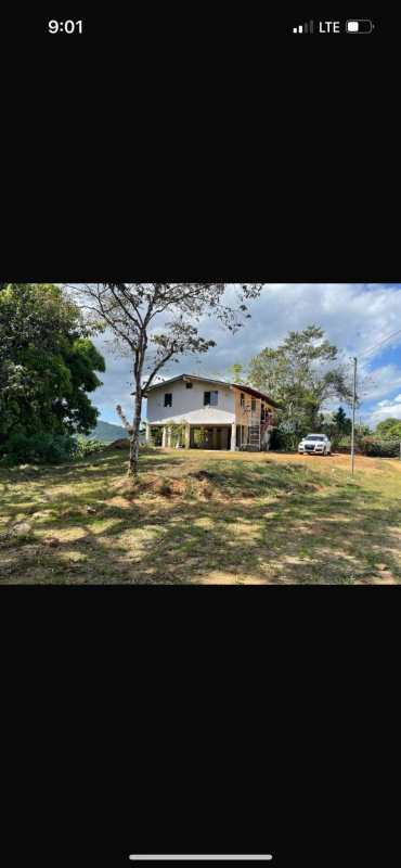 Traditional elevated countryside home with open yard in Chilibre Panama
