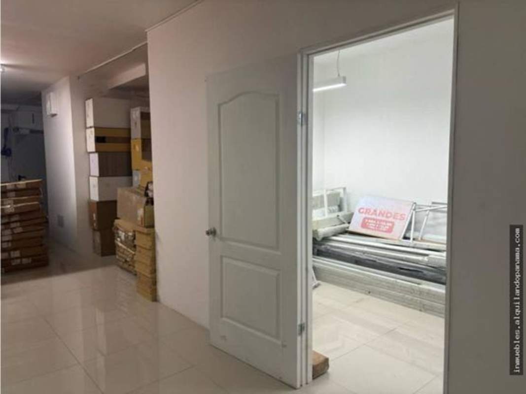 Empty tiled interior with ample space for retail or office at Signature Point Via España Panama