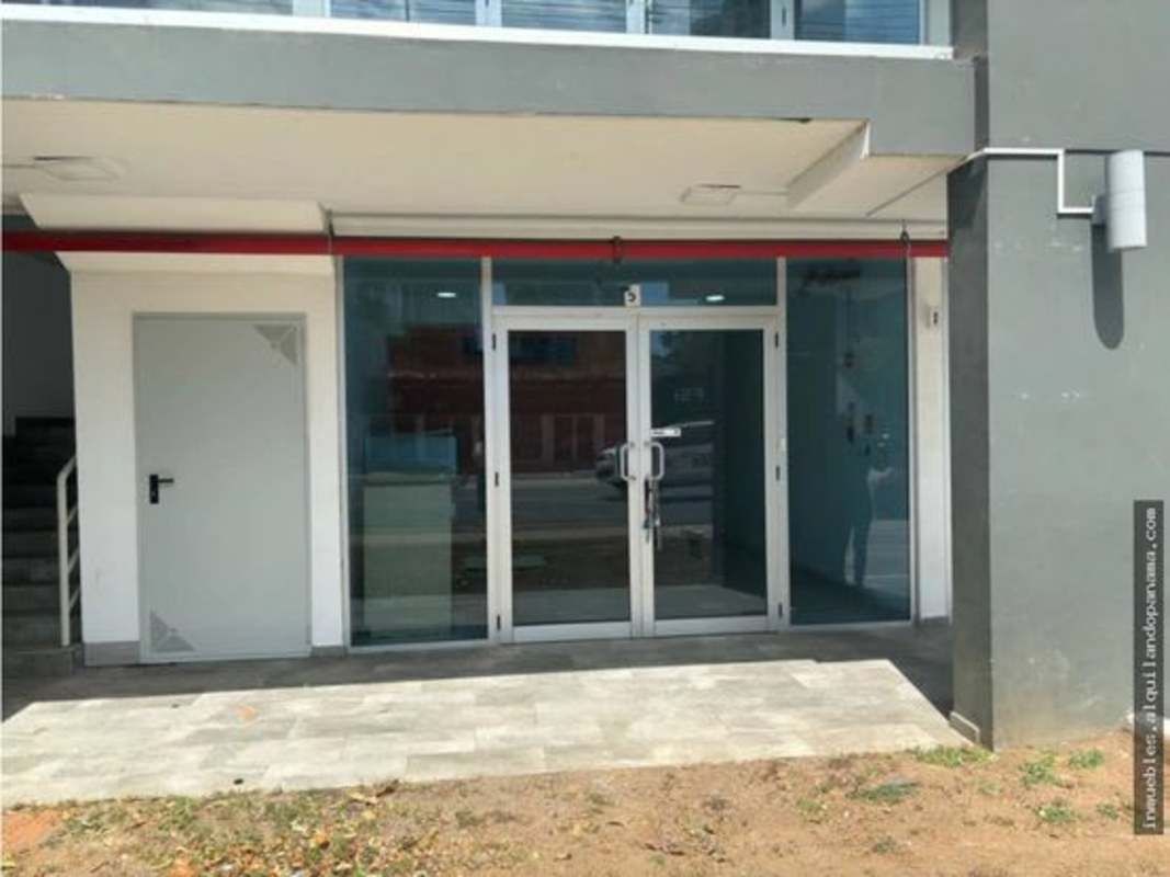 Front entrance with glass doors at Signature Point Via España Panama City