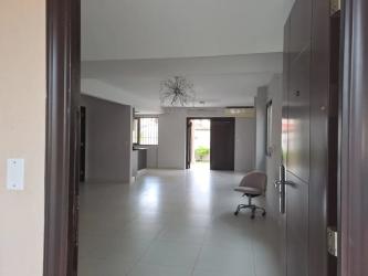 Modern spacious living room with big windows Howard Panama Pacifico