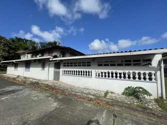 Dining room with windows overlooking garden Margarita Colón Panama