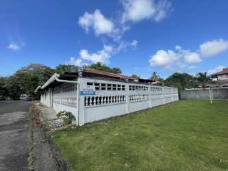 Living room with large windows, tile floors in Margarita Colón Panama