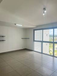 Kitchen with breakfast counter and appliances in PH Mosaic Howard Panama for sale