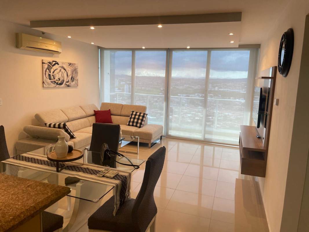 Spacious living dining area with city view large windows PH Top Tower Costa del Este Panama