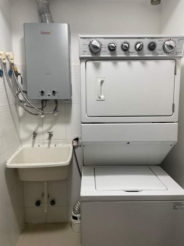 Laundry room washer dryer tankless water heater PH Top Tower Costa del Este Panama