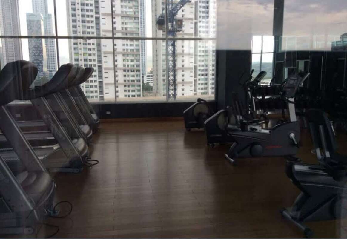 Gym large windows city skyline view PH Top Tower Costa del Este Panama