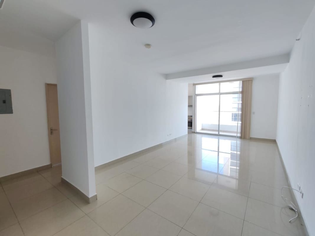 Kitchen with cabinetry, window views, gas stove and tile flooring at PH Rainbow Tower El Carmen Panama