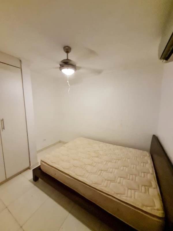 Bathroom featuring walk-in shower, beige ceramic tile, and pedestal sink in San Francisco Panama