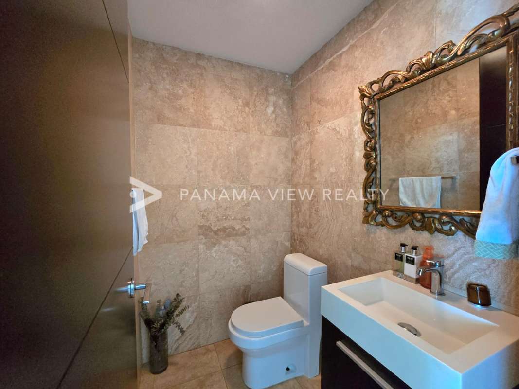 Large balcony with city and ocean views in PH Titanium Costa del Este Panama
