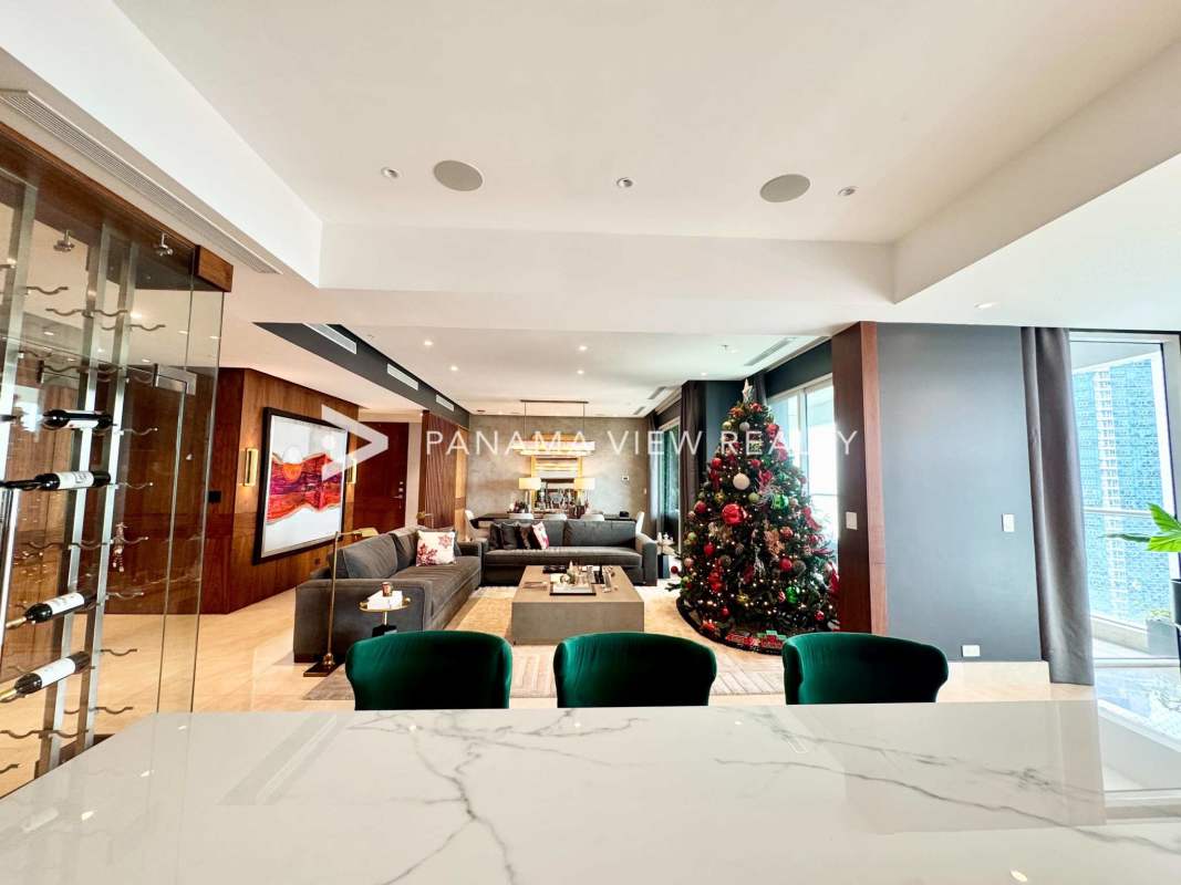 Spacious modern living room with ocean views and large windows in PH Aria Panama