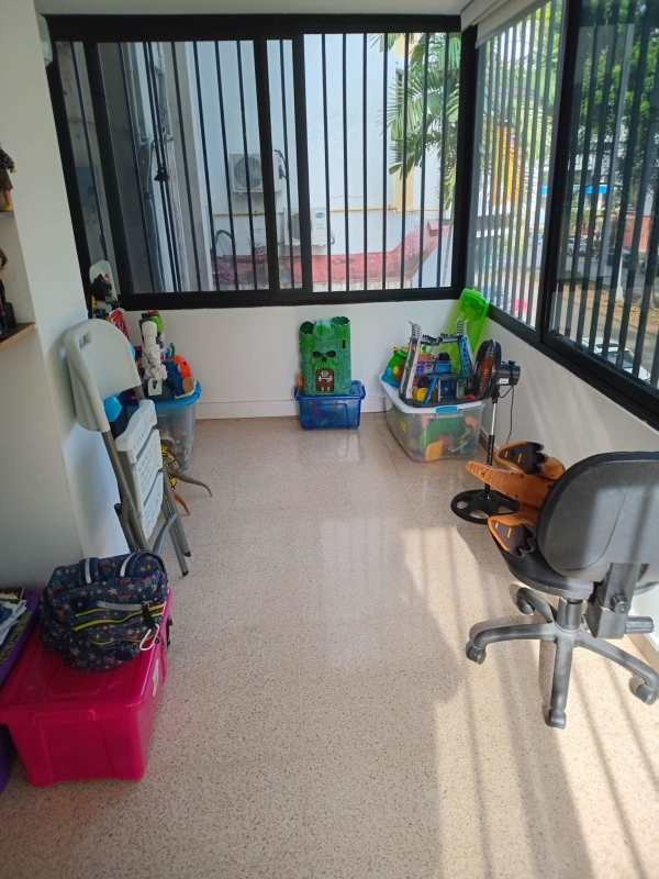 Bright sunroom or playroom with toys large windows PH La Joya Panama