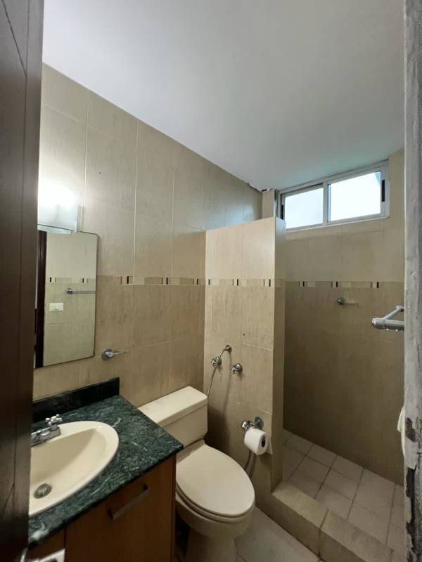 Bright living room with ceramic floors and ocean view windows in PH Titanium Tower Panama