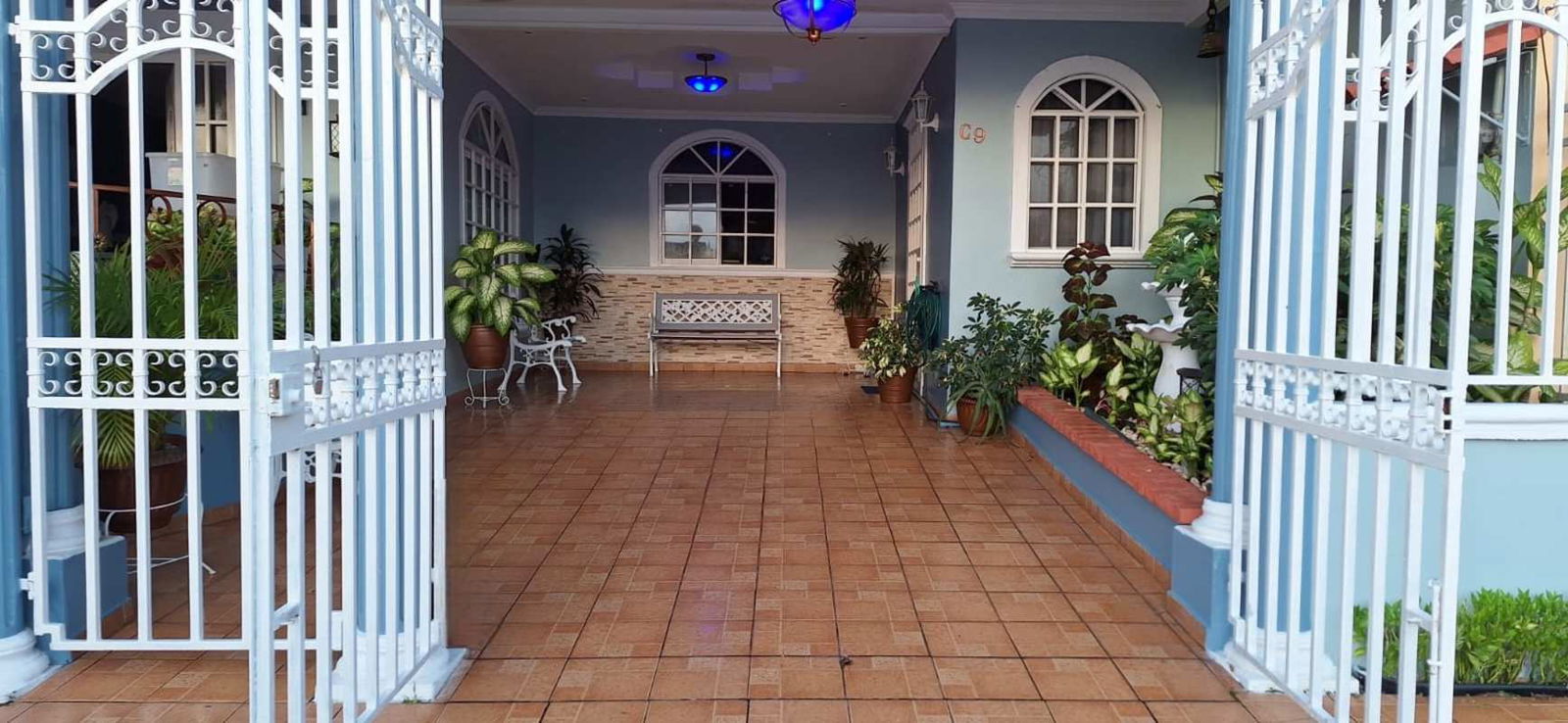 Covered porch with tile and decorative arches Camino Real San Antonio Panama