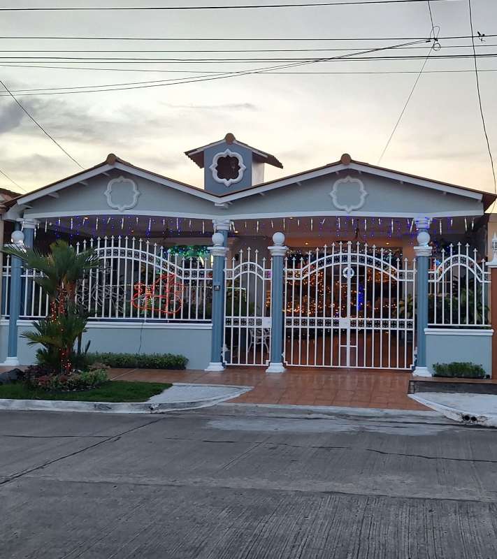 Front garden and decorative fence at remodeled home in San Miguelito Panama