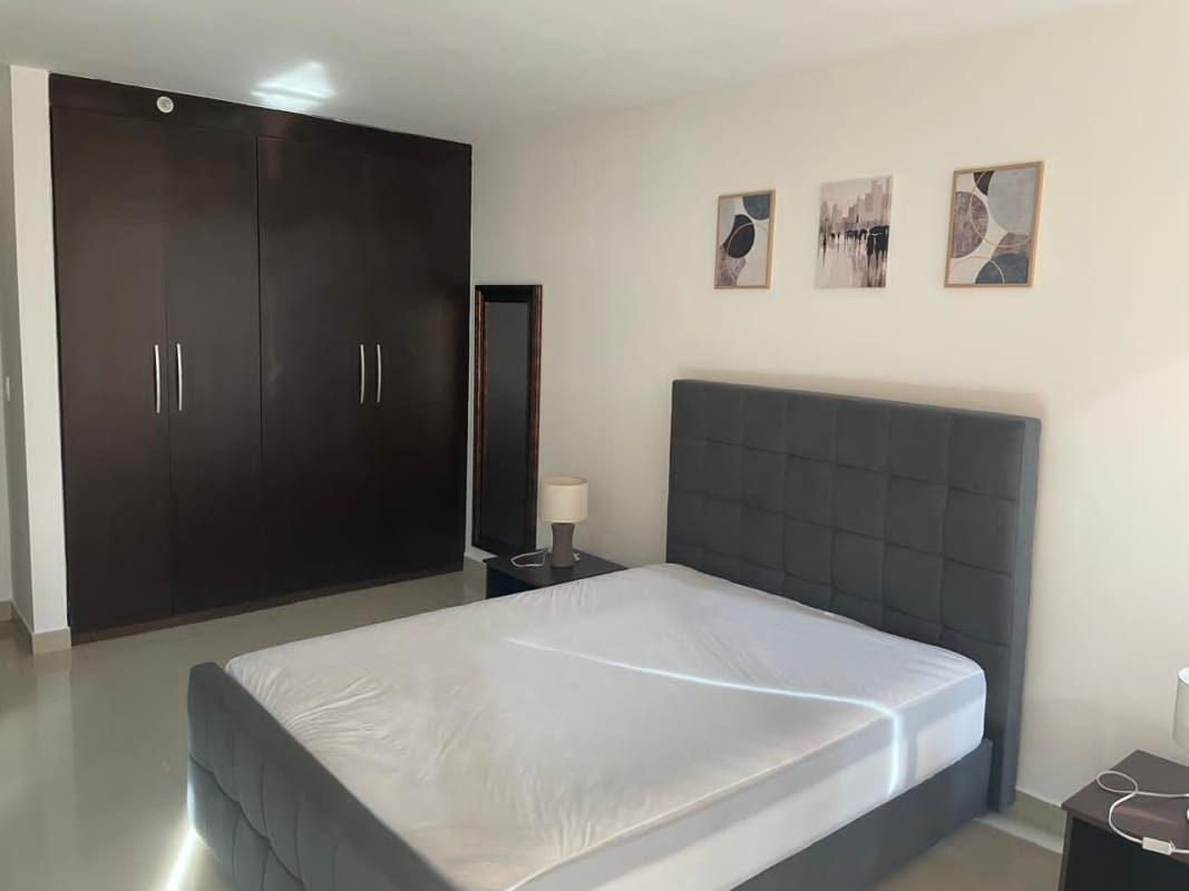 Furnished master bedroom with large window, en-suite bathroom, AC in Top Tower Panama