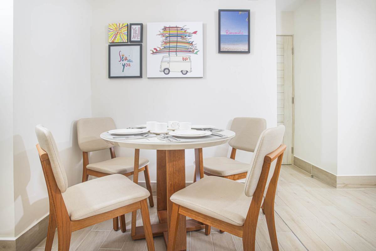 Aerial view of Surfside Playa Caracol resort with condos and beach