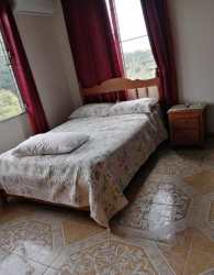 Bathroom with tiled walls, granite vanity and hot water shower rental house Santiago Panama