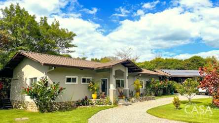 Modern kitchen with granite countertops open layout Gualaca Boquete Panama river home