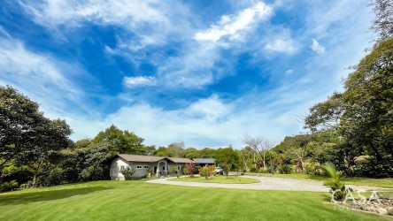 Open plan living dining with balcony access river view Gualaca Panama estate