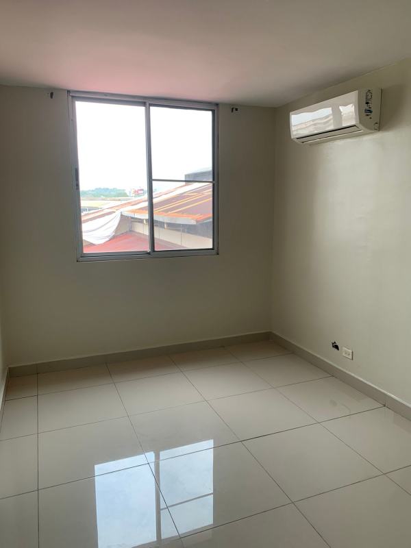 Bedroom with air conditioner, closet, balcony view, El Cangrejo Panama rental