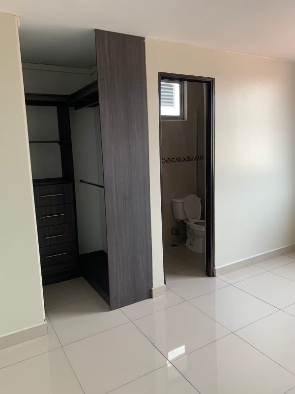 Bedroom walk-in closet and ensuite bathroom modern design El Cangrejo Panama