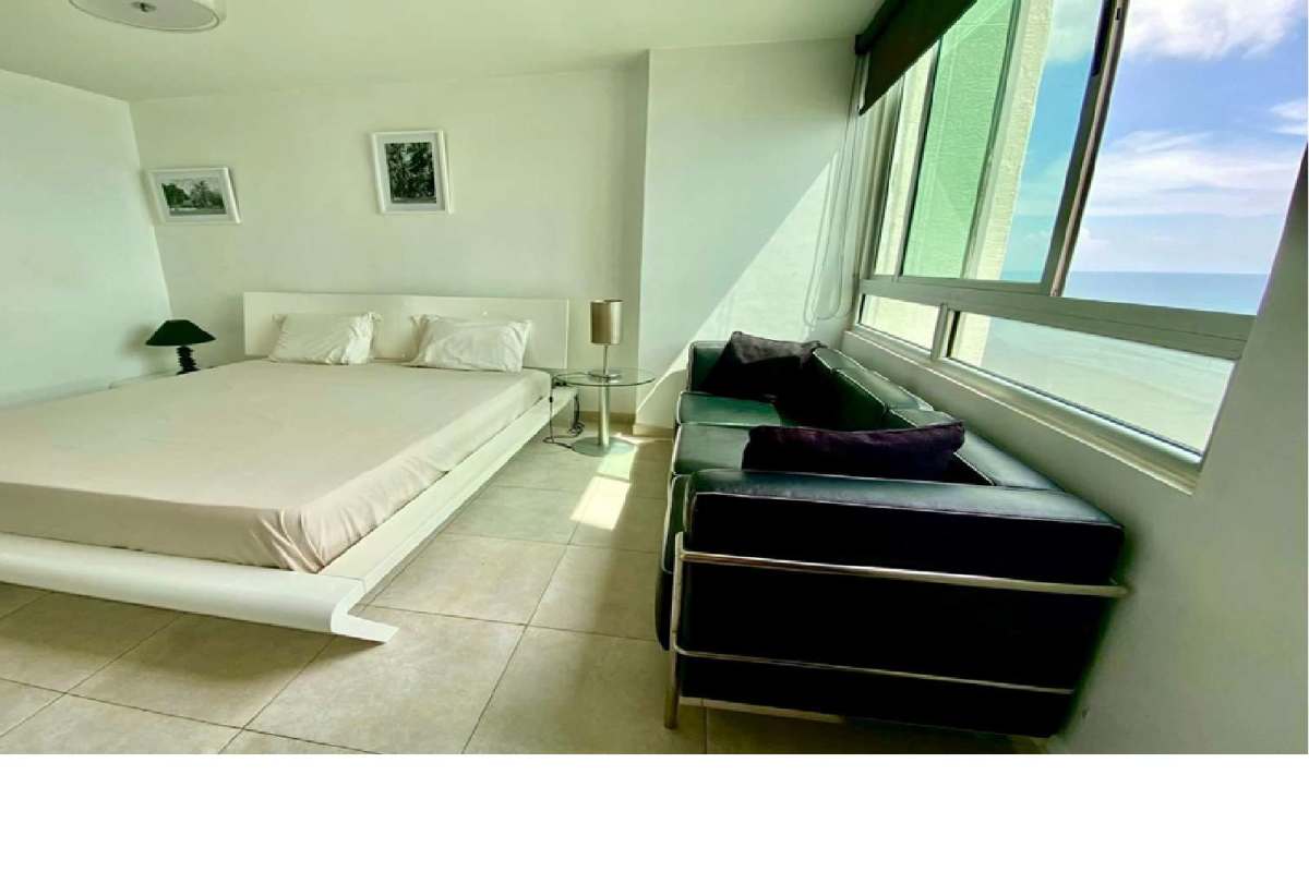 Master bedroom with ocean view, large windows, AC in PH Terrawind Coco del Mar Panama City