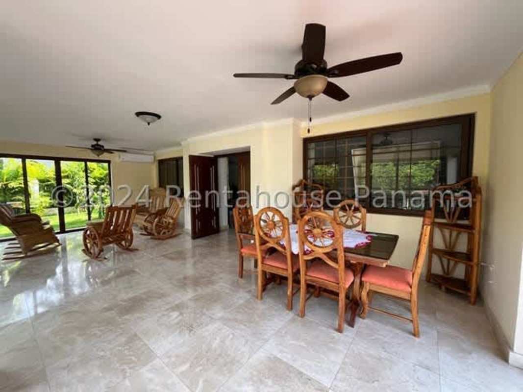 Spacious marble-tiled entry foyer with staircase in Clayton luxury residence