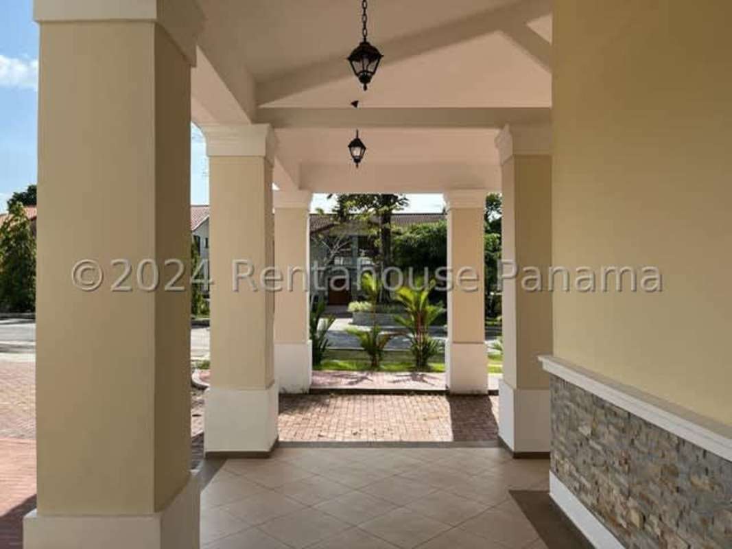 Front covered walkway with columns in luxury Clayton gated home Panama