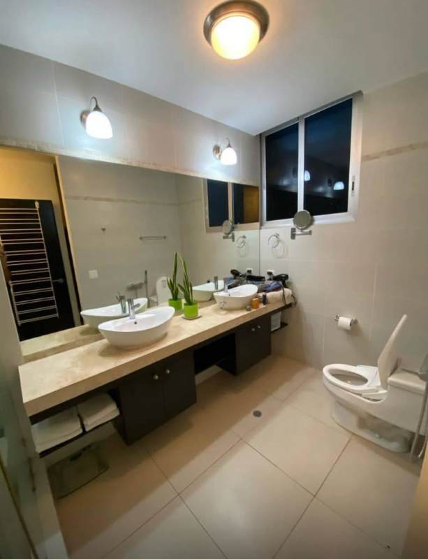 Elegant master bedroom with balcony and direct ocean views PH Destiny Panama