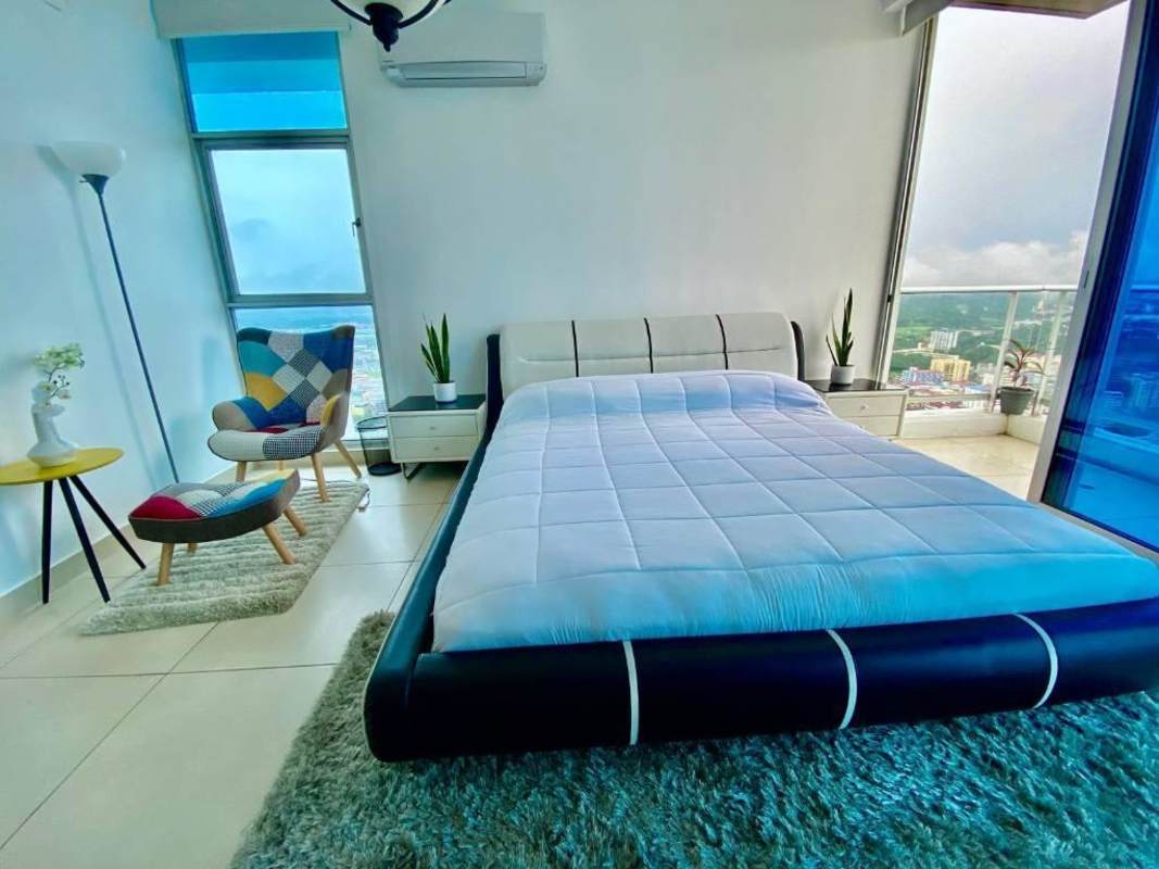 Bright second bedroom with city views floor-to-ceiling windows PH Destiny Tower Panama City
