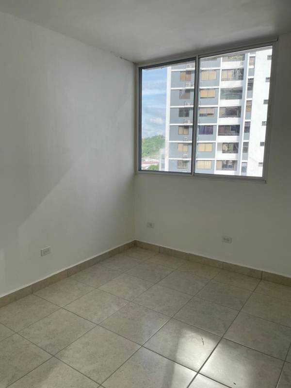 Kitchen with double sink and wood cabinets, Torre El Cangrejo rental Panama