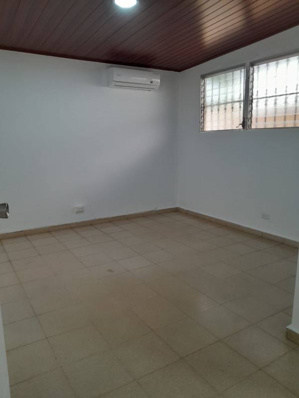 Kitchen with marble backsplash, double sink, wood panels Cerro Viento