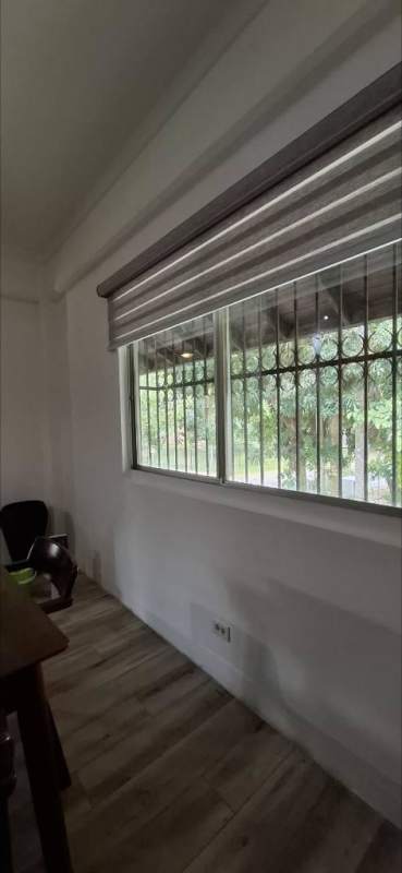 Balcony with glass railing nature view in Curundu Heights near Albrook Panama