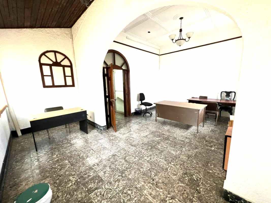 Office with arched doorway, chandelier and vintage features in Perejil Business Center Panama City