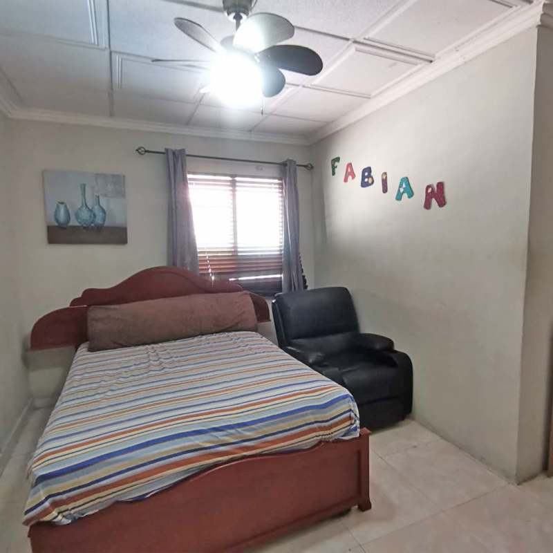 Covered outdoor terrace space with garden in single-family house Panama