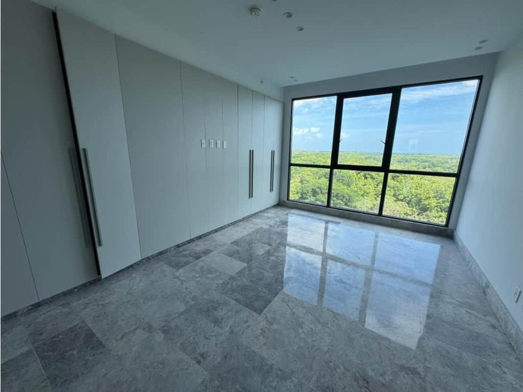 Spacious balcony with glass railing and panoramic golf course view in Empire Residences Santa Maria Panama