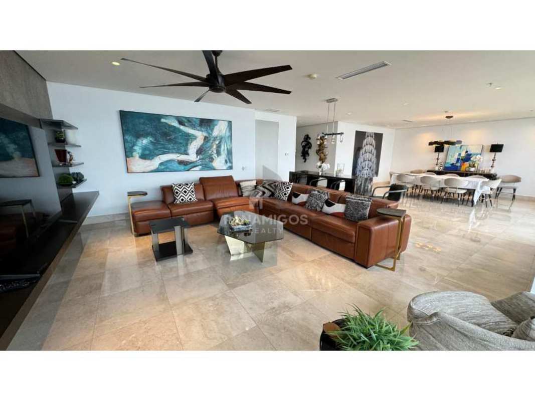 Modern open-plan living and dining room with panoramic ocean views in luxury condo PH Matisse Costa del Este Panama