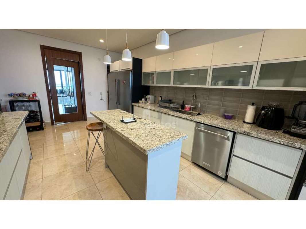 Modern designer kitchen with granite countertop island and stainless appliances in PH Matisse Panama