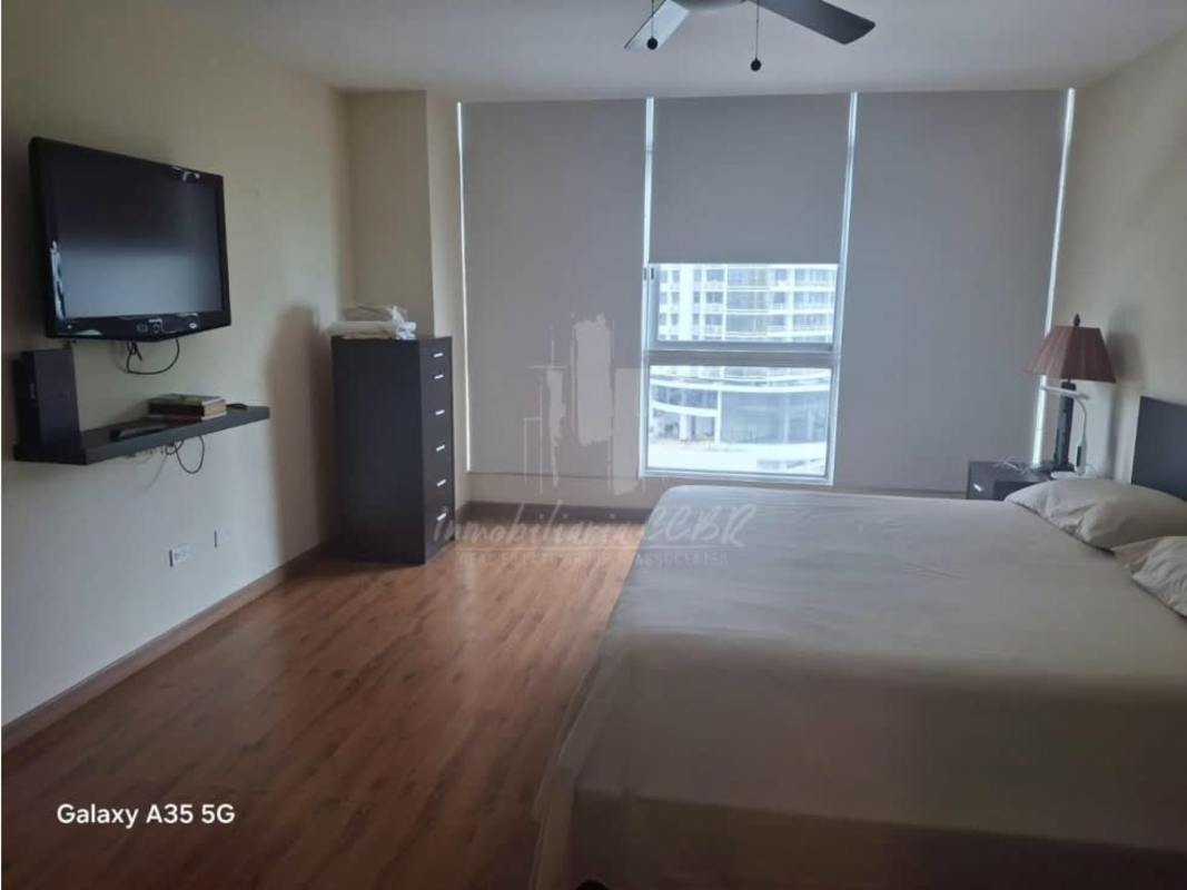 Bright master bedroom with large window, city views, flat TV in PH Bayfront Tower Avenida Balboa