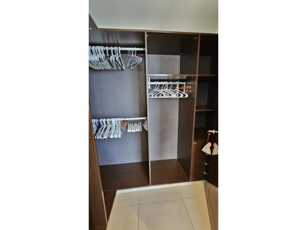 Open kitchen with granite countertops and stainless appliances in PH Oceanaire Punta Pacifica Panama