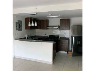 Spacious living room with large sliding doors to balcony PH Midrise Panama Pacifico