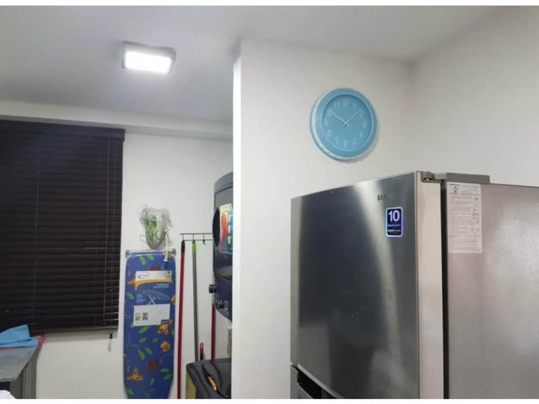 Modern bedroom with tufted headboard and built-in wardrobe in PH Sky Park Carrasquilla Panama