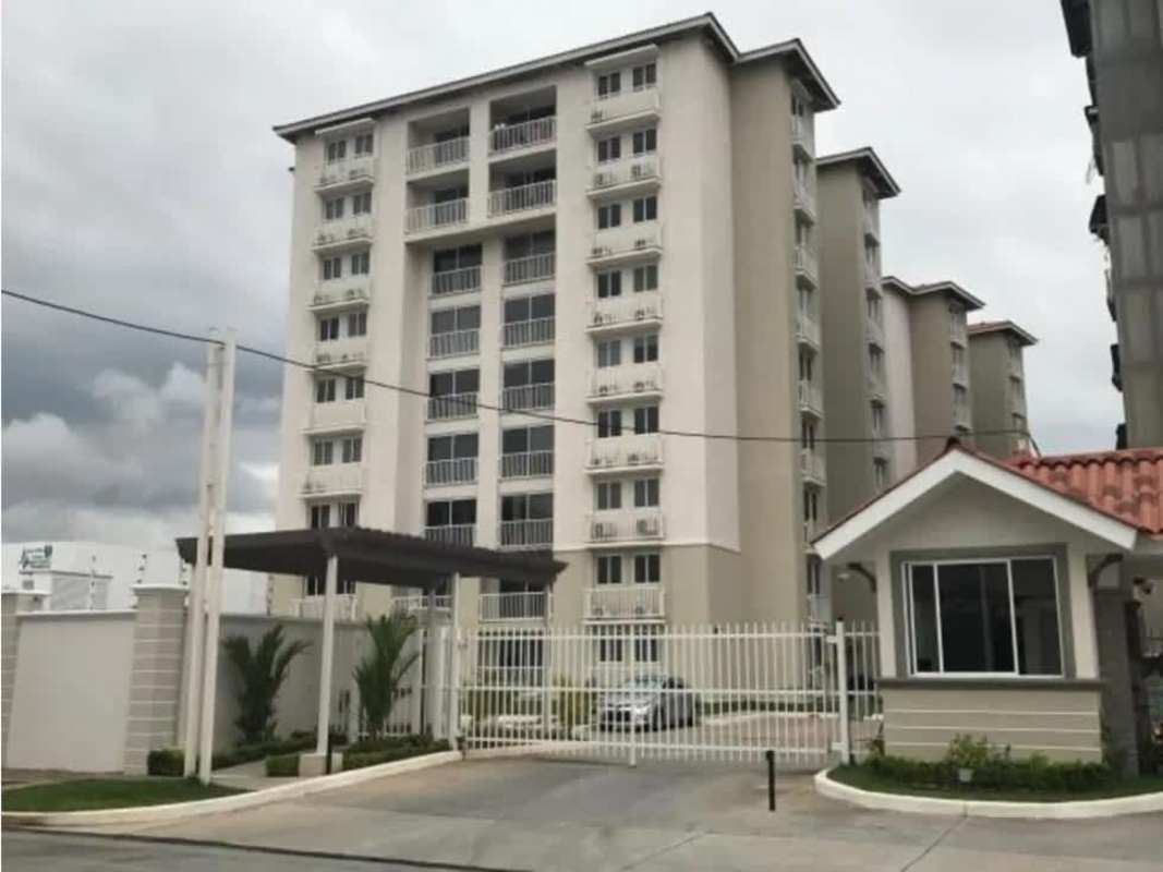 Multi-story apartment buildings with gated entrance at PH Torres de Versalles II Costa Sur Panama